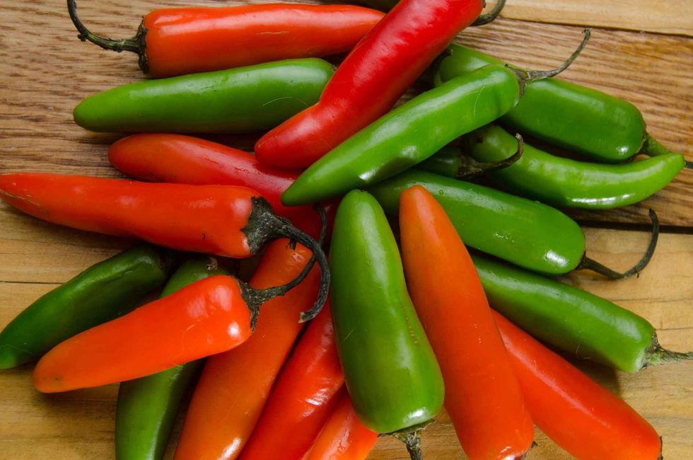 Serrano pepper on wood background