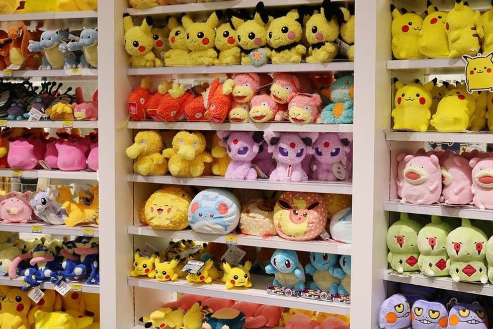 Shelves full of Pokemon soft toys inside the Pokemon Center - Nicknames
