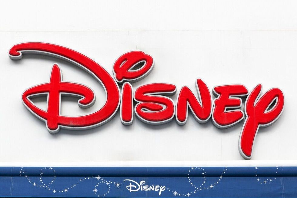 Sign of Disney store on a wall.