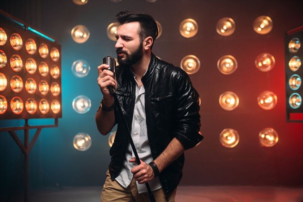 Singer with microphone on the stage