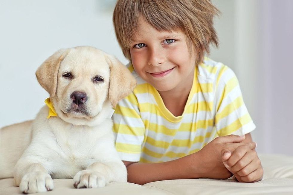 Smiling child with dog