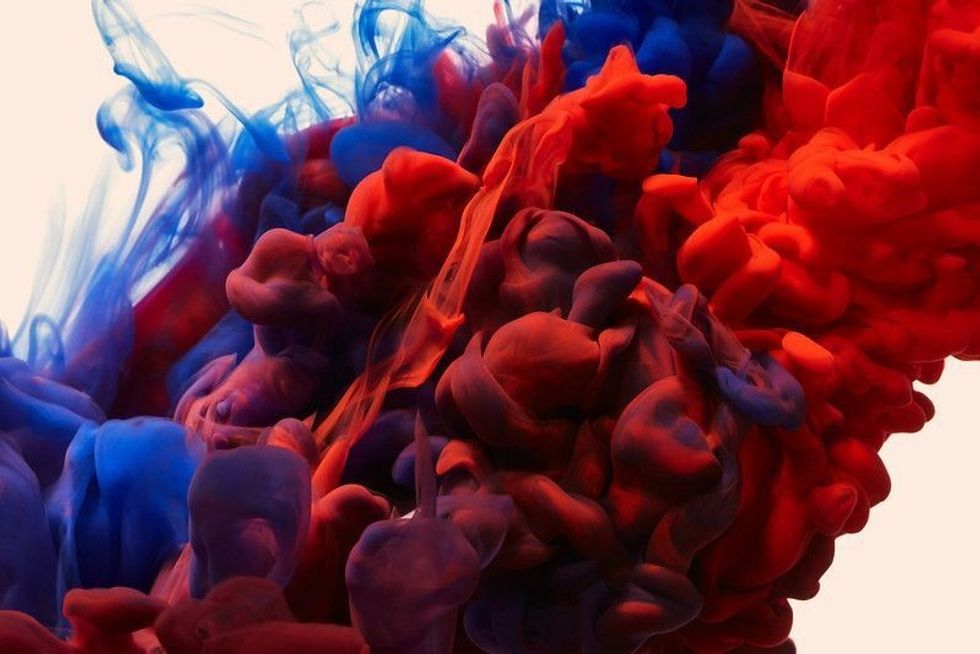 Splash of blue and red paint