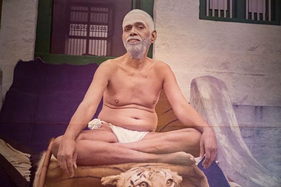 Sri Ramana Maharshi sitting in ashram