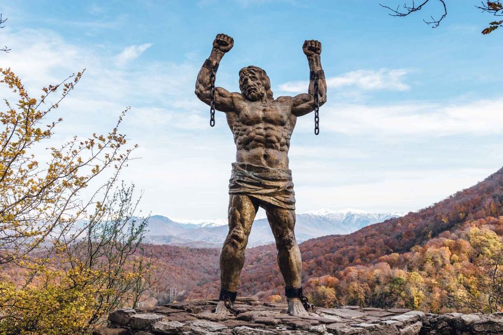 Statue of Unbound Prometheus with Broken Chain