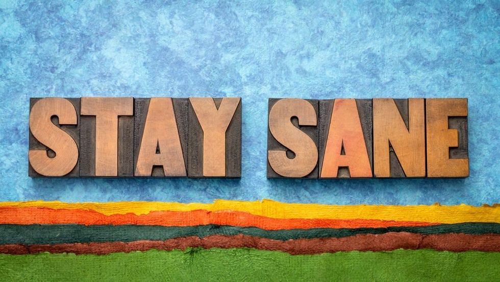 stay sane - inspirational word abstract in vintage letterpress wood type