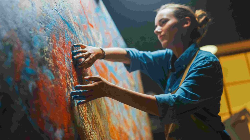 Talented Innovative Female Artist Draws with Her Hands on the Large Canvas, Using Fingers She Creates Colorful, Emotional, Sensual Oil Painting.