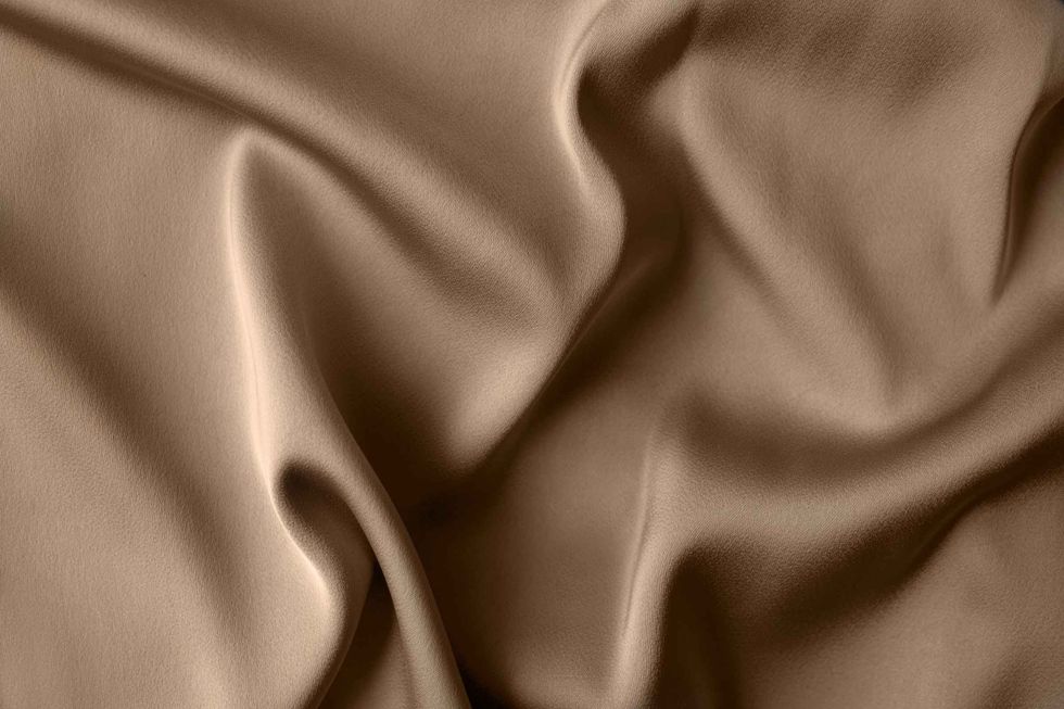 Tan colored smooth silk fabric