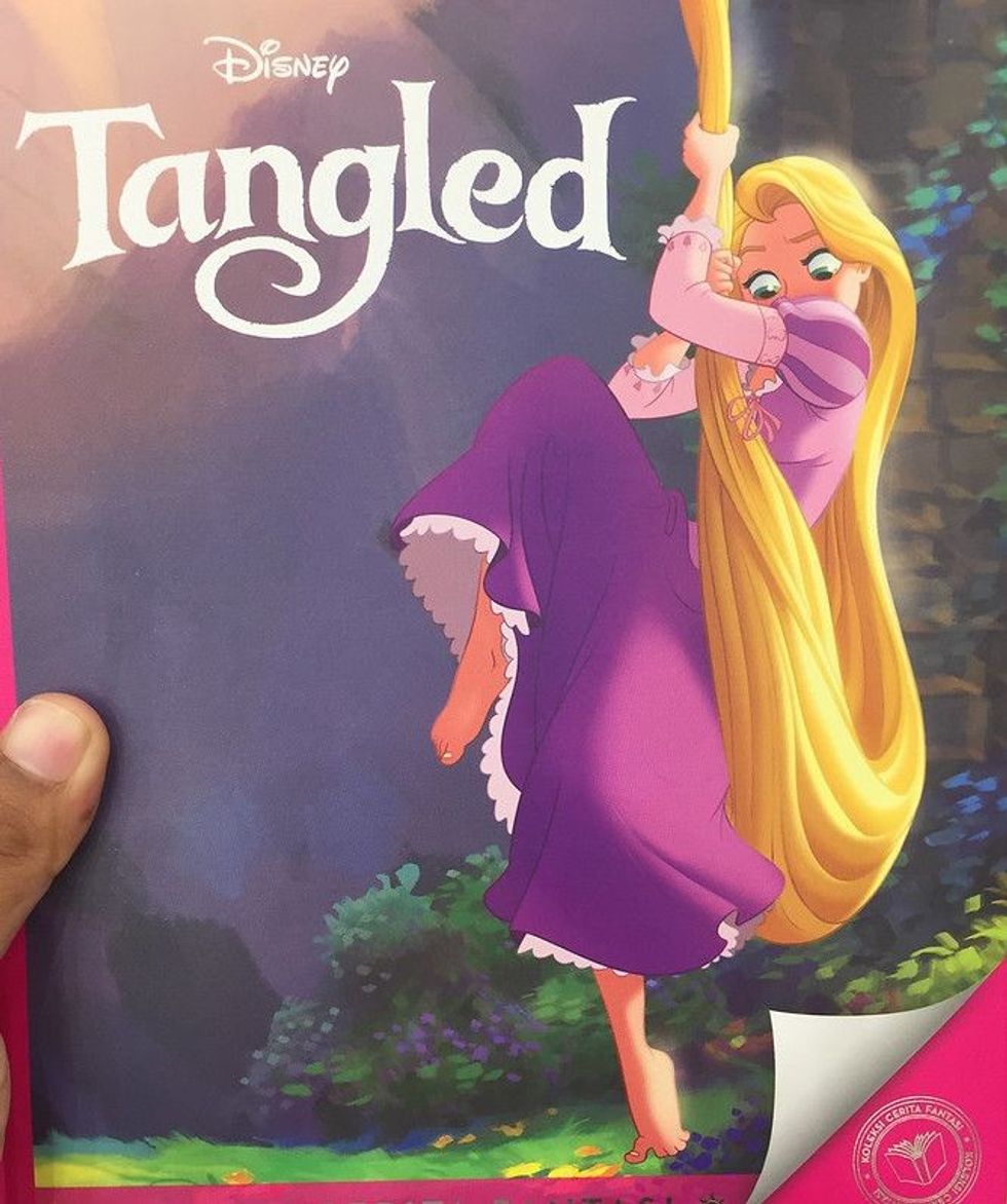 Tangled movie poster showing Rapunzal