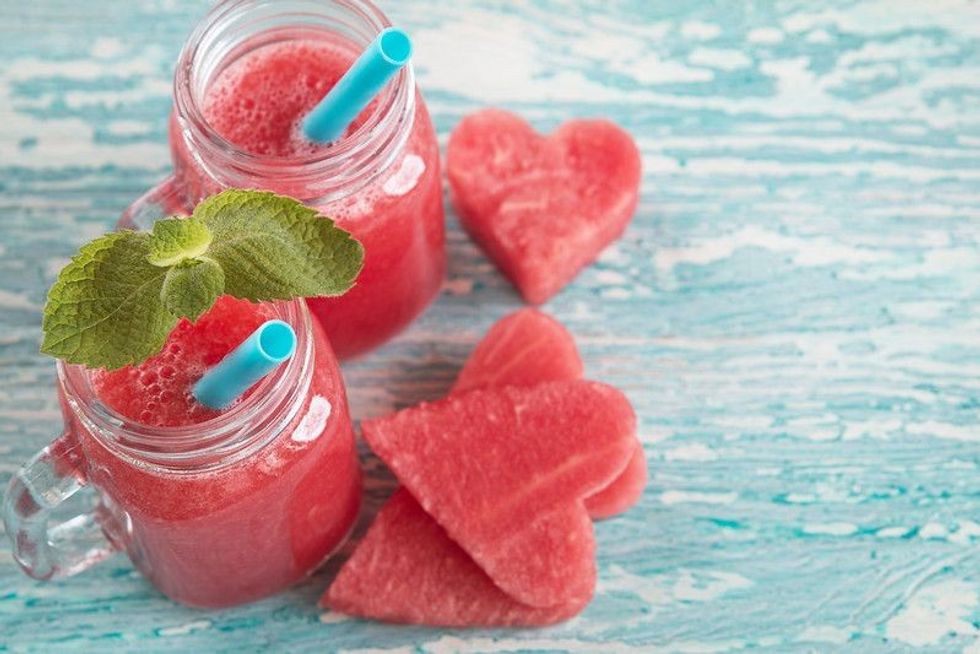 Tasty watermelon smoothie with heart shape watermelon slices