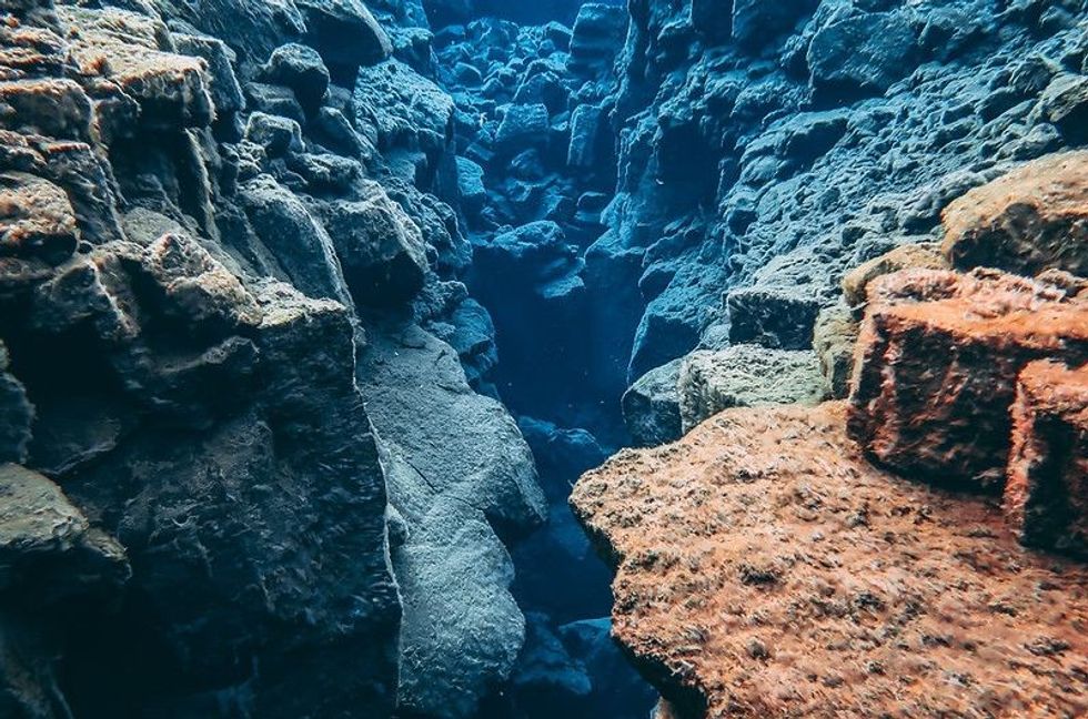 Tectonic plates are the ones that lead to changes in landforms and oceans.