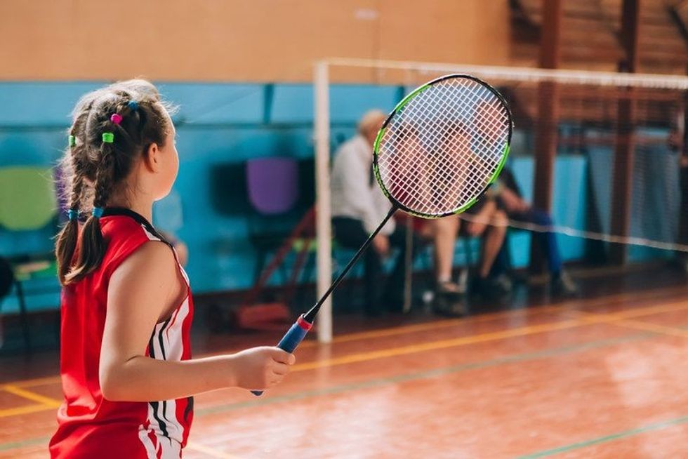 Tennis player with a racket. 