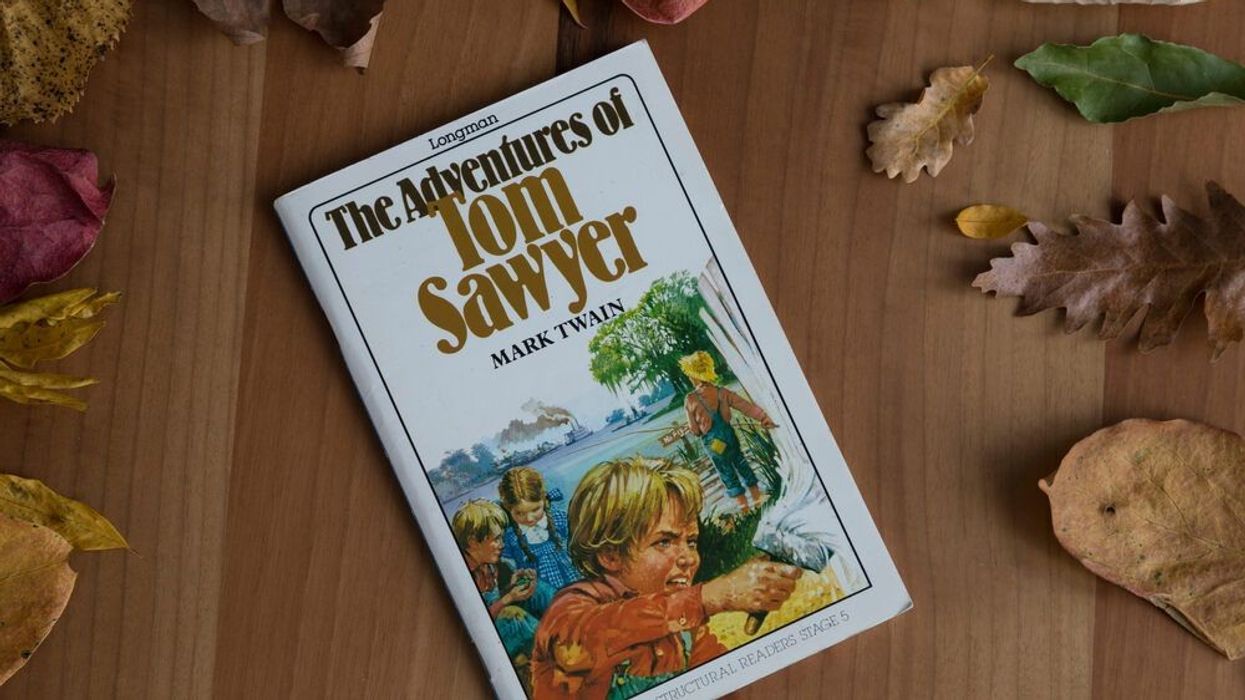 The Adventures of Tom Sawyer by Mark Twain.