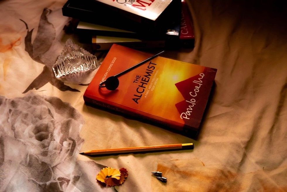 The Alchemist written by Paulo Coelho, 90th impression.