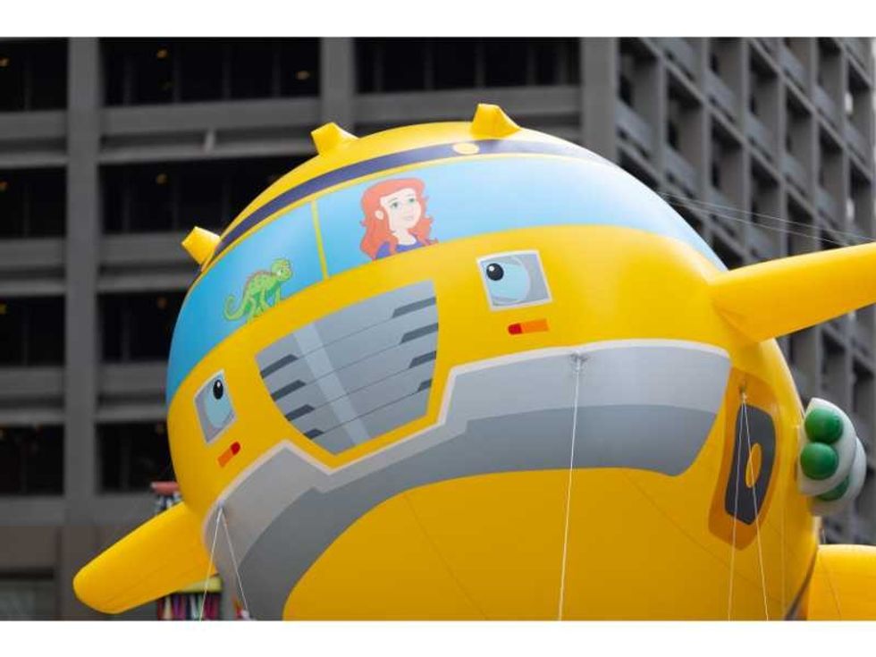 The Magic School Bus going down Milam Street