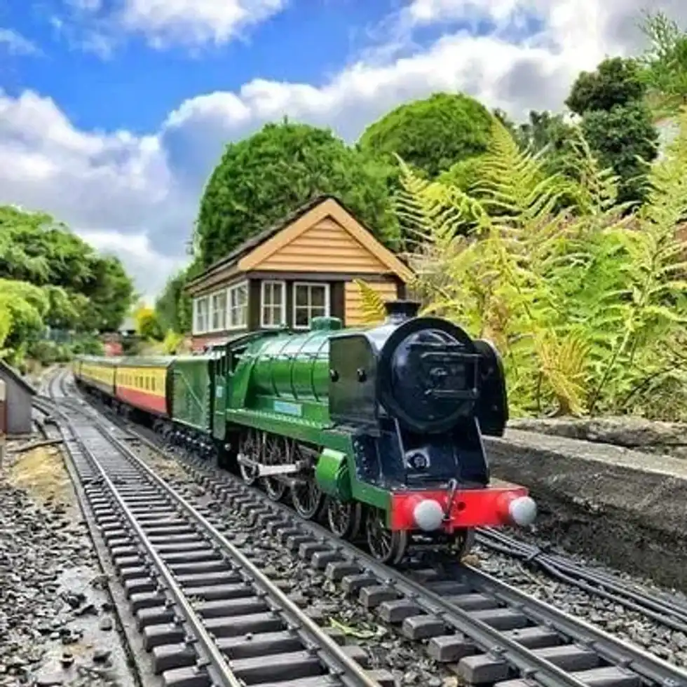 The model train on the tracks at Bekonscot Model Village & Railway.