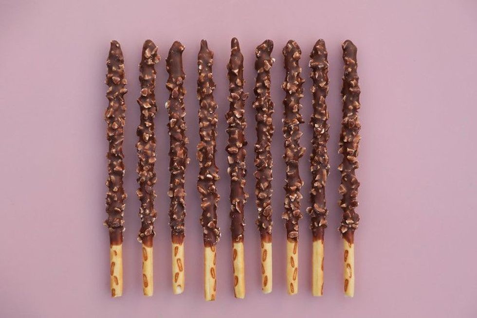 These sticks were fully coated in chocolate at first. But later, a bit was left uncoated.