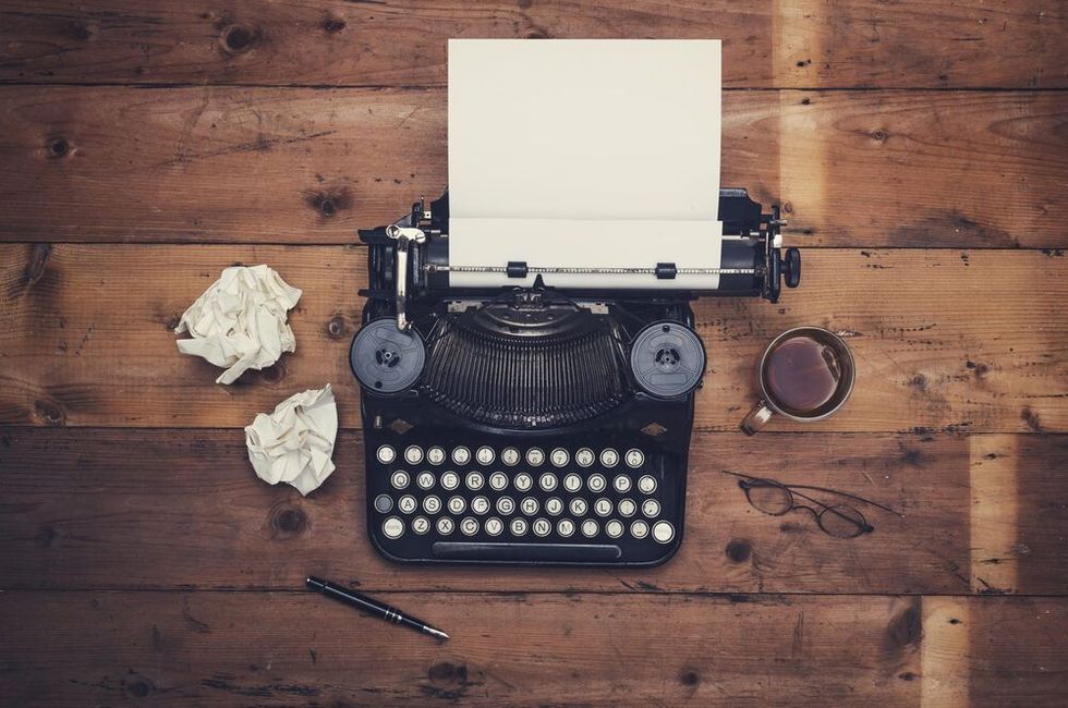 Top view thirties retro writers desk with typewriter