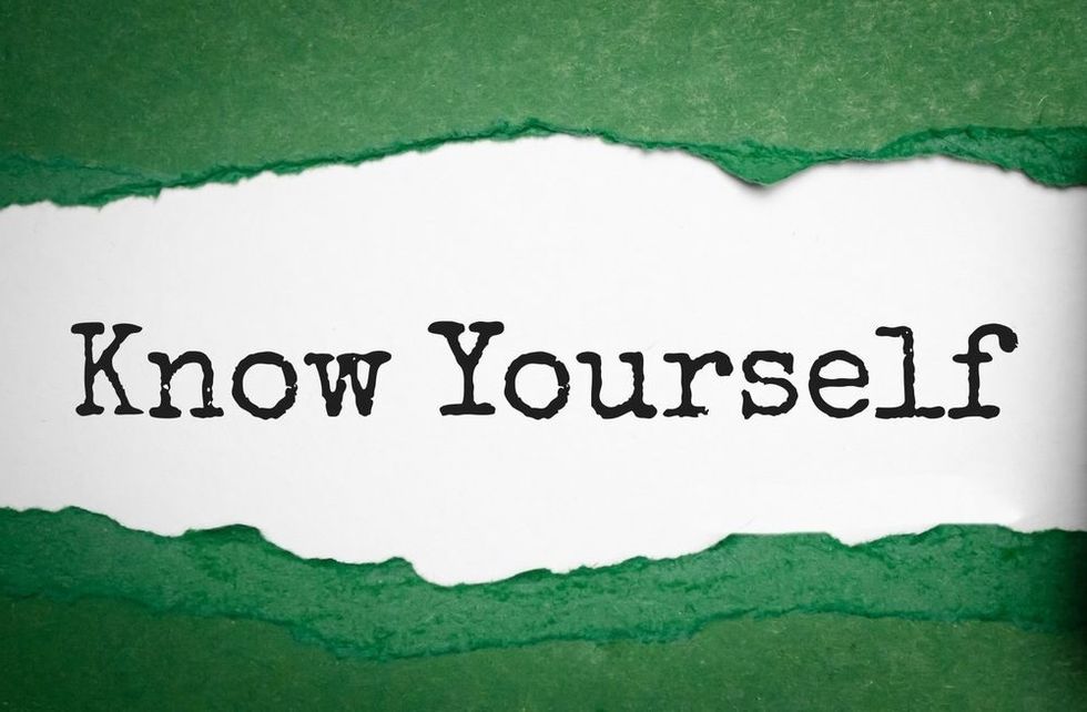Torn paper strip on a bright green background with the text KNOW YOURSELF