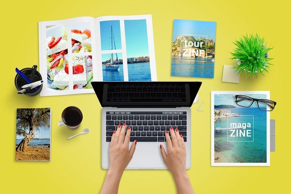 Travel reporter, journalist write blog or newspaper article on laptop computer