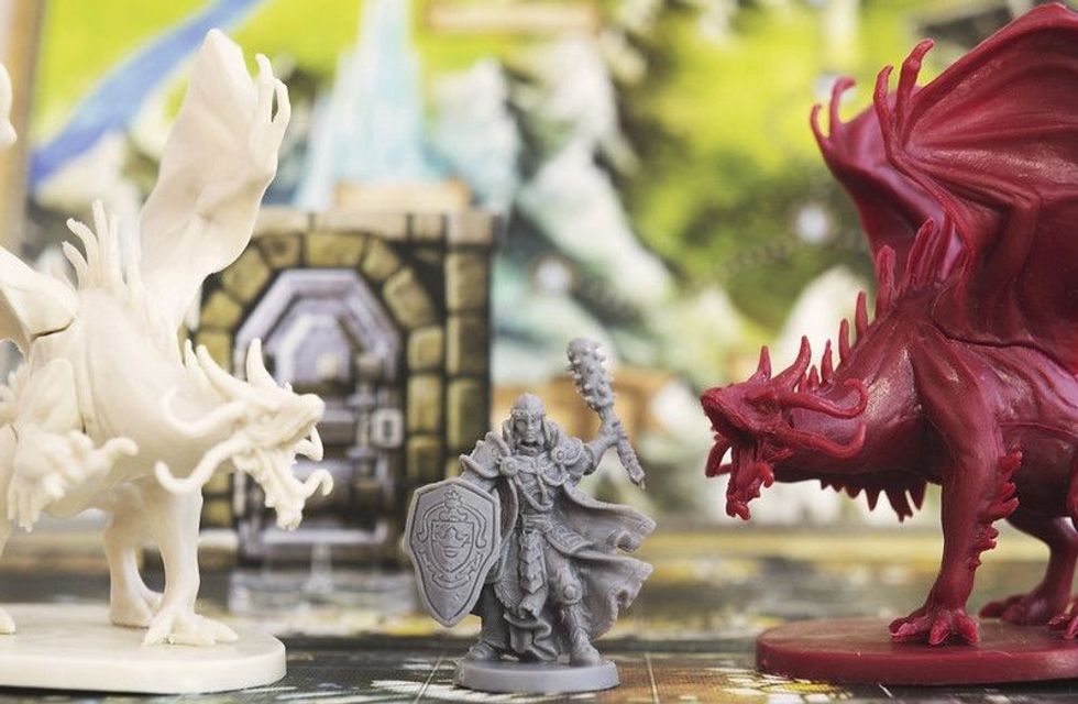 Two dragons and an armoured warrior
