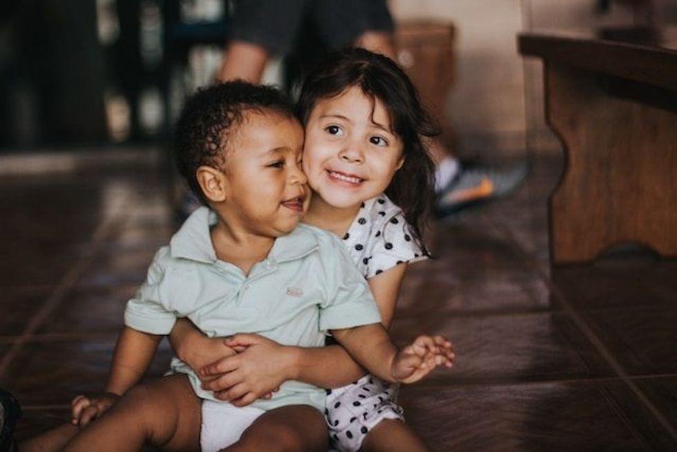 Two kids hugging