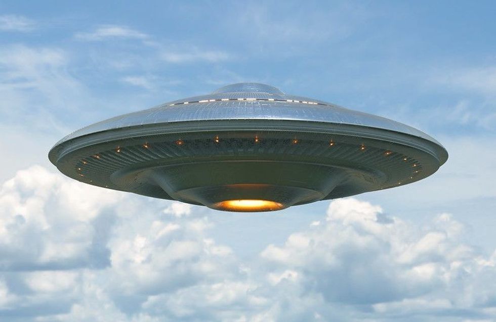 Unidentified flying object on light blue neutral background.