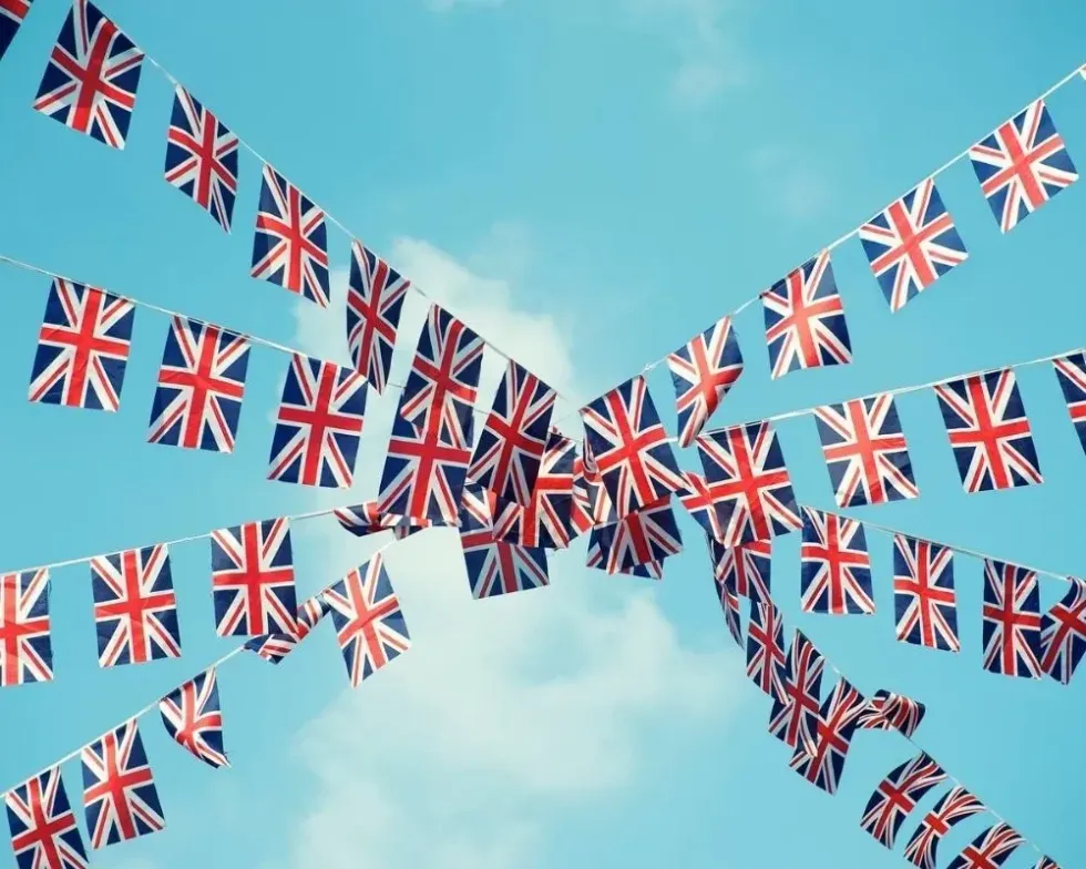 Union Jack bunting streaming from a maypole to celebrate VE Day.