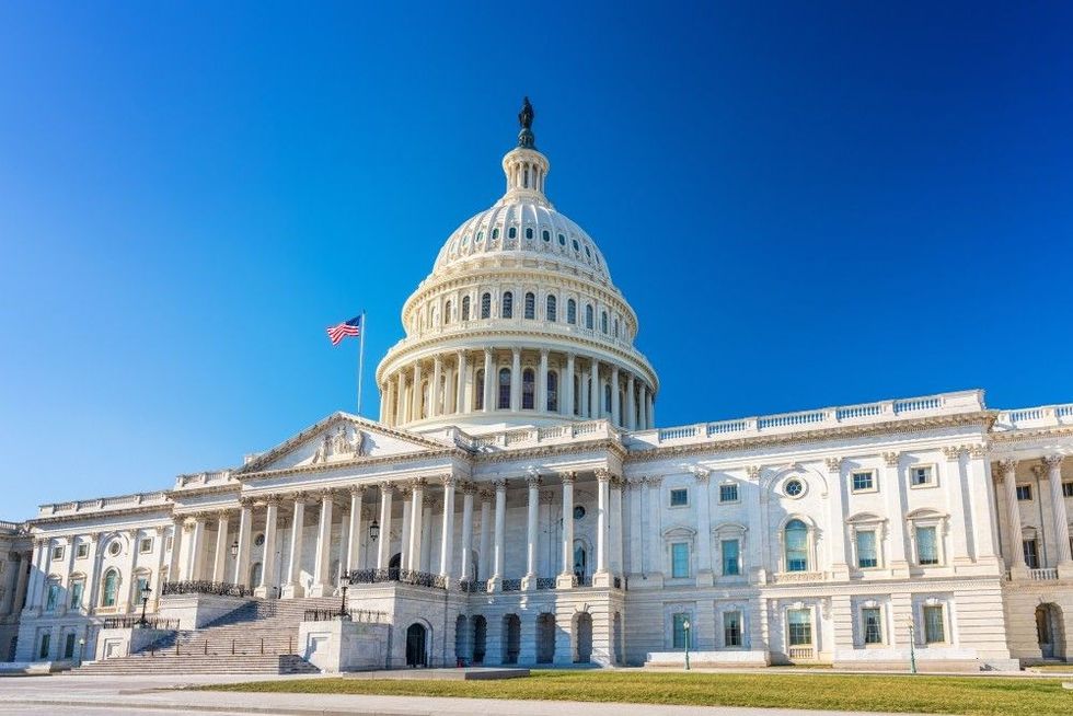 US Capitol over blue sky