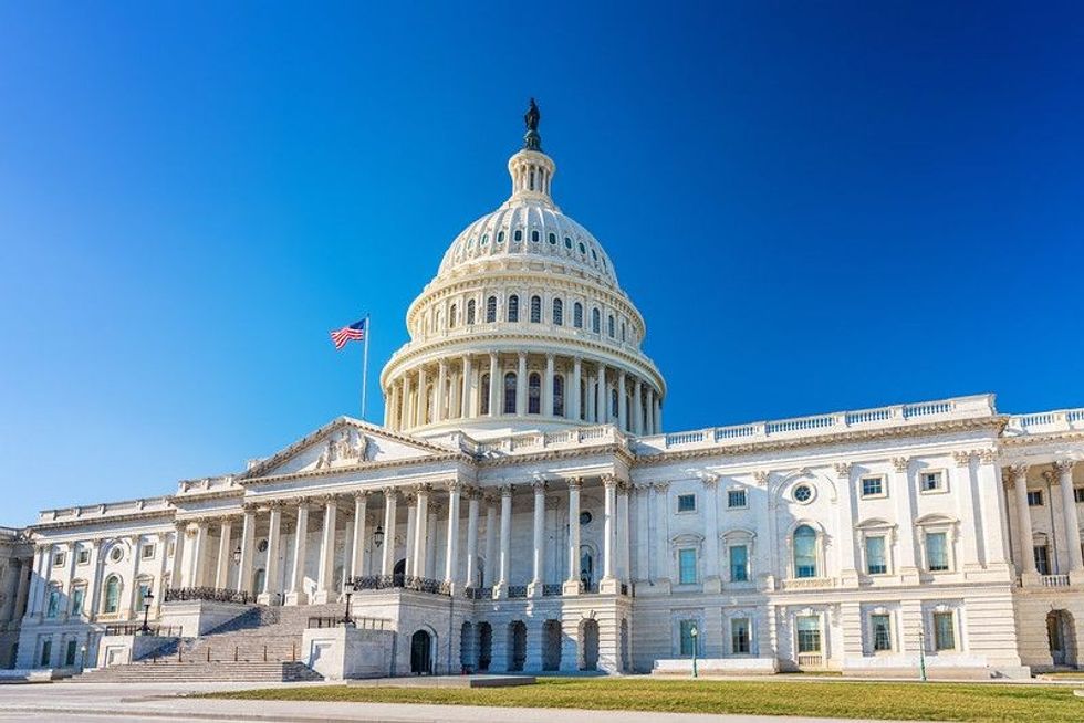 US Capitol over blue sky