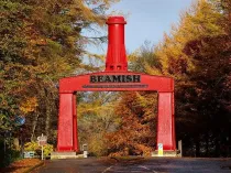 View of a huge red steam hammer at the entrance of Beamish.