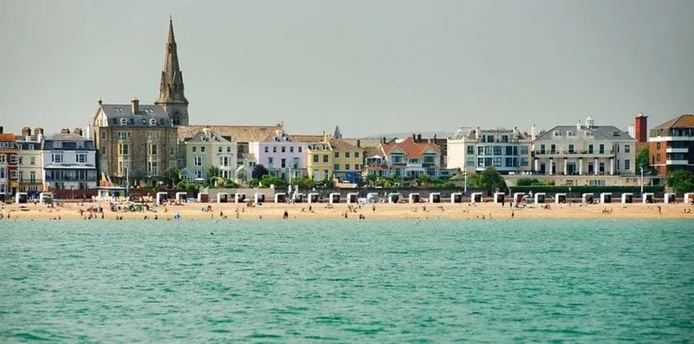 View of Weymouth Beach backed by Georgian houses.