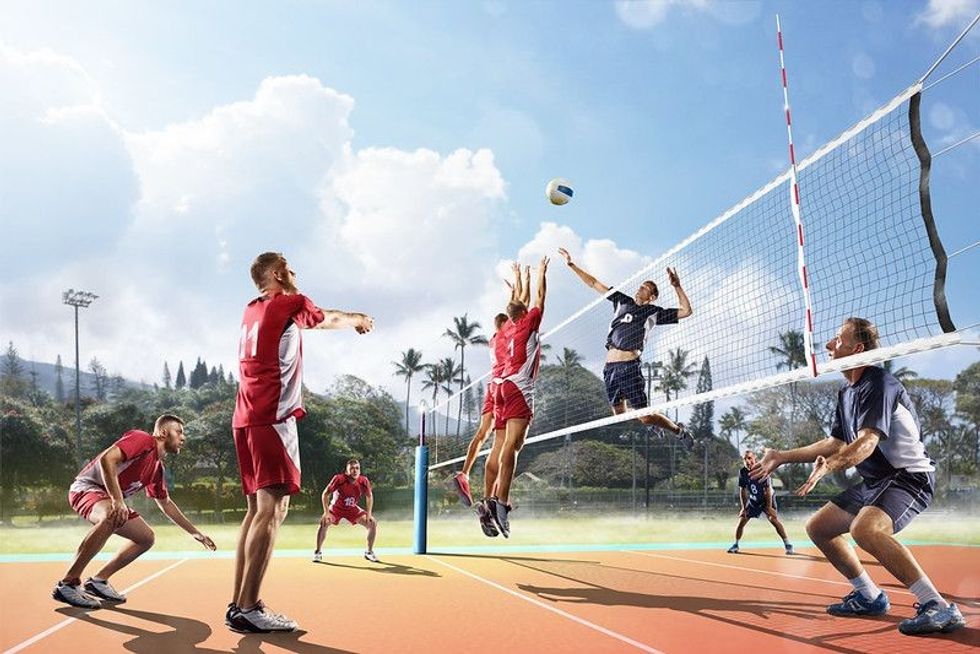 Volleyball players in between a match