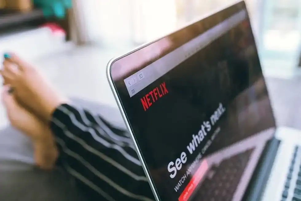 Watching a teen-friendly TV show on Netflix.