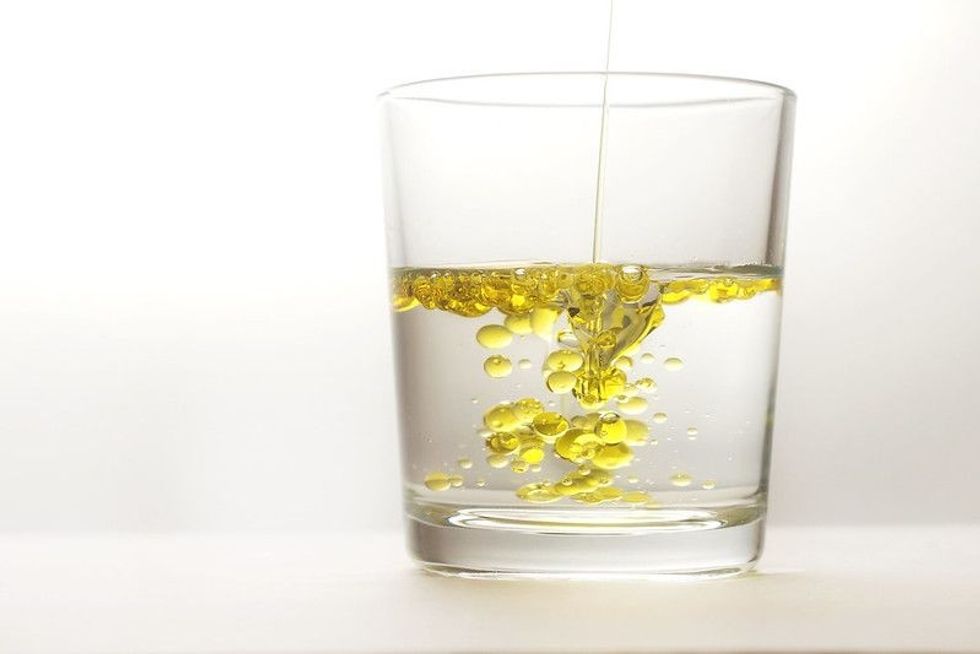 Water and oil in glass.