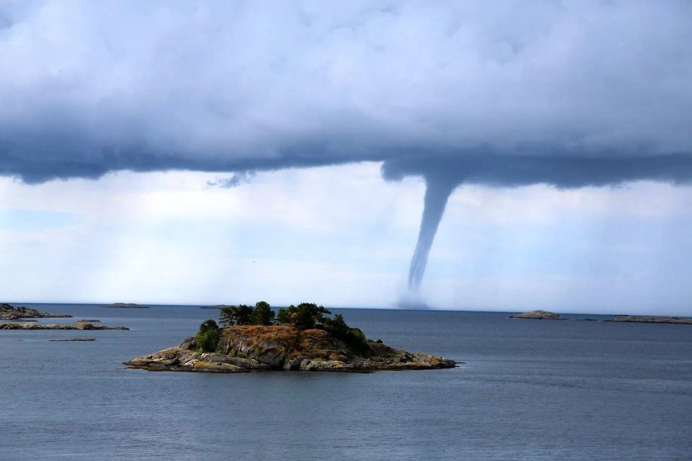 waterspout is a column of cloud filled