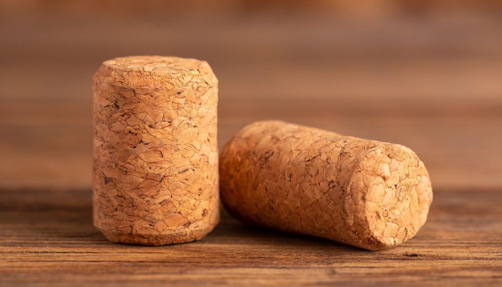 Wine corks close-up on a wooden table.