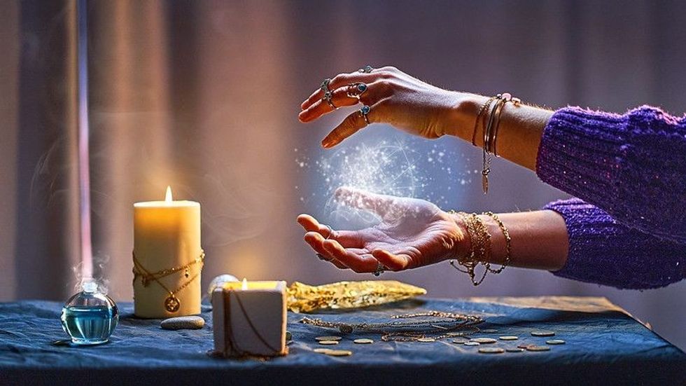 Women performing magic