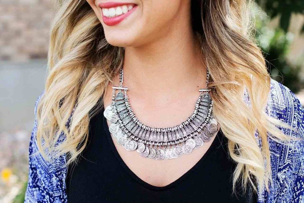 Women wearing silver jewelry.