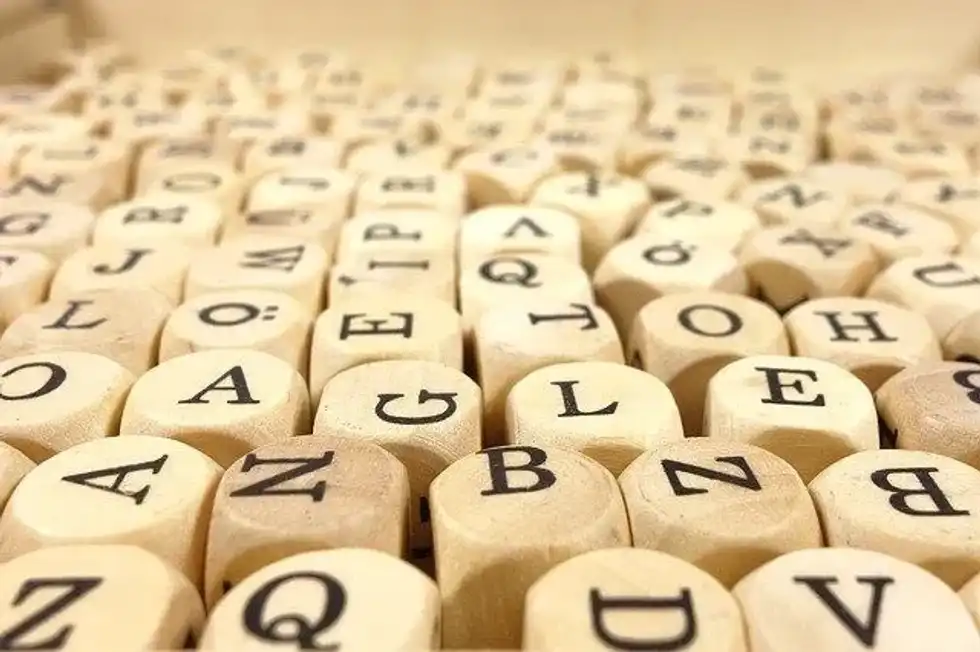 Wooden cubes with alphabets printed on top