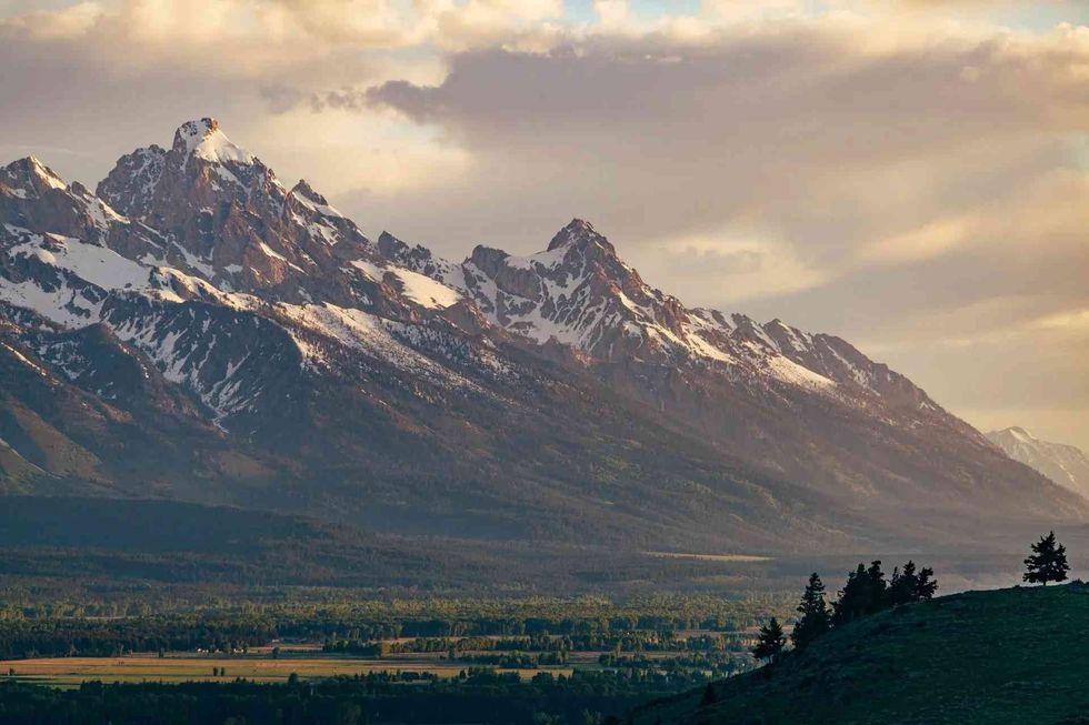 Wyoming is home to three national parks, - Yellowstone, Grand Teton, and Devils Tower