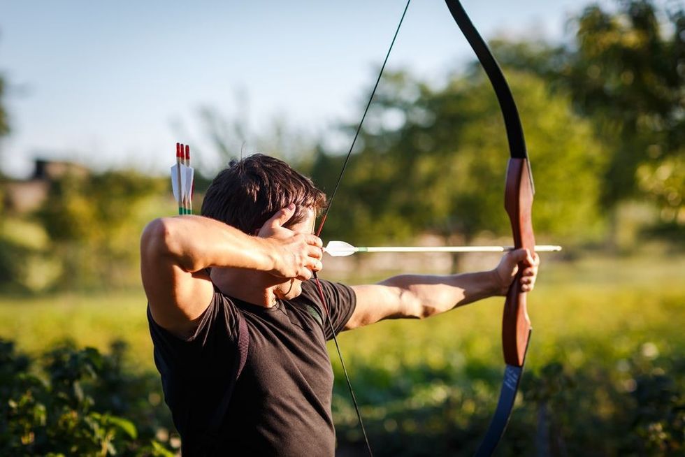 Young archer training with the bow