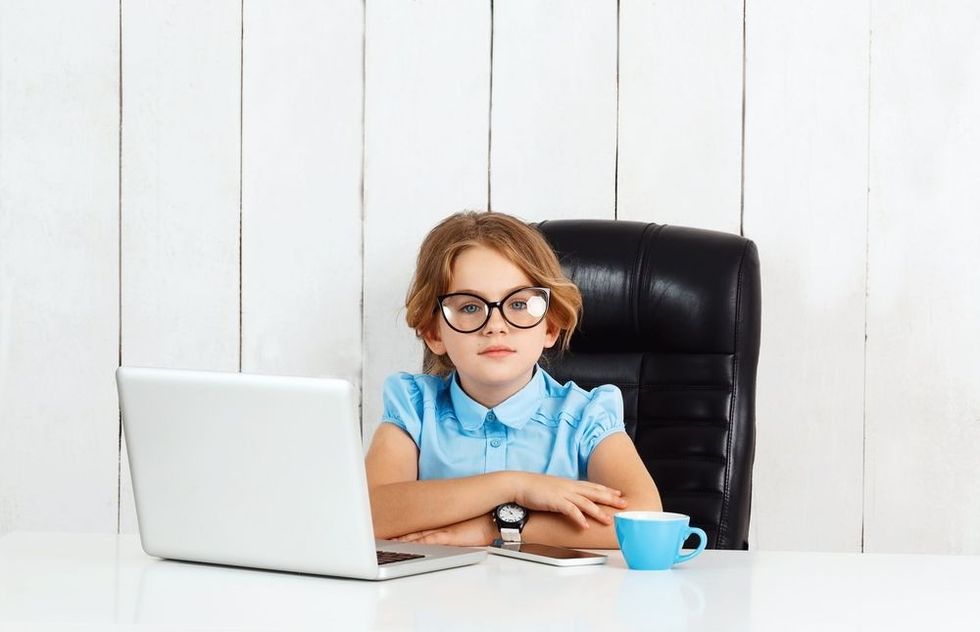 Young beautiful girl in a professional getup