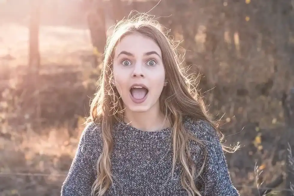 Young girl excited to learn new fun facts.