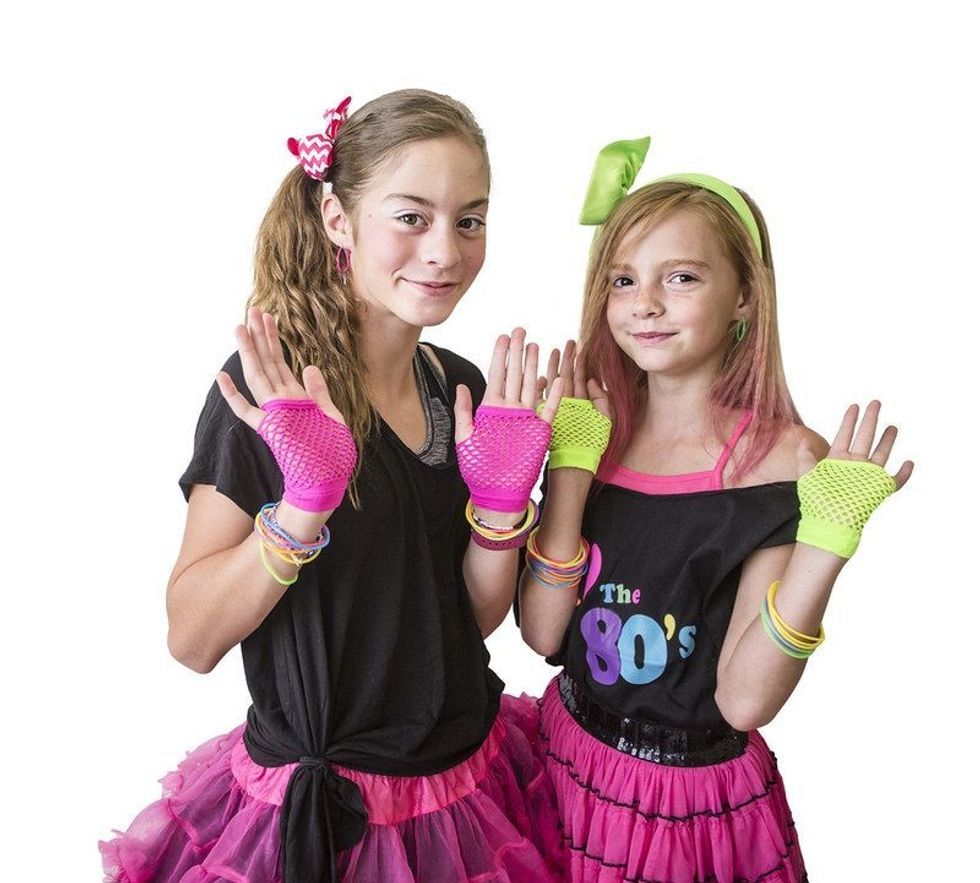 Young girls dressed in retro 80s clothing