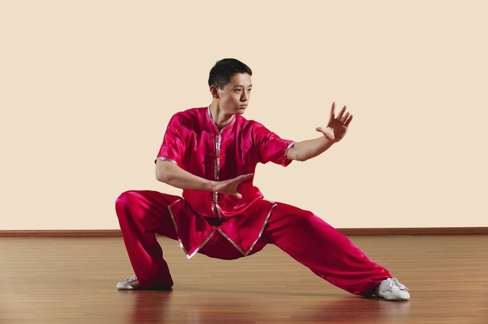 Young man practicing martial arts.