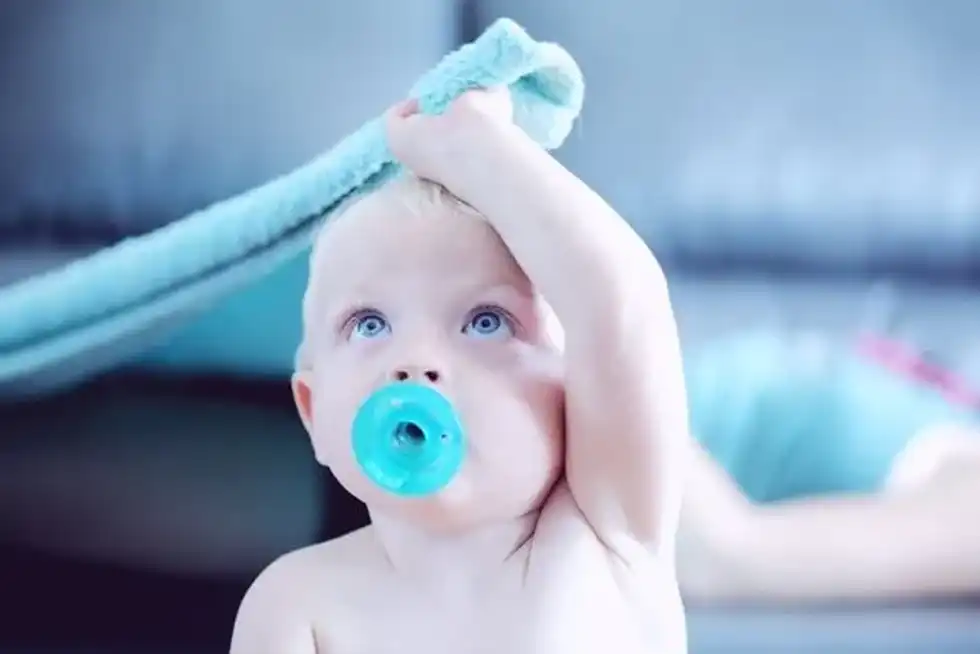 Your 10-month-old will be smiling and giggling, and spending more time playing now